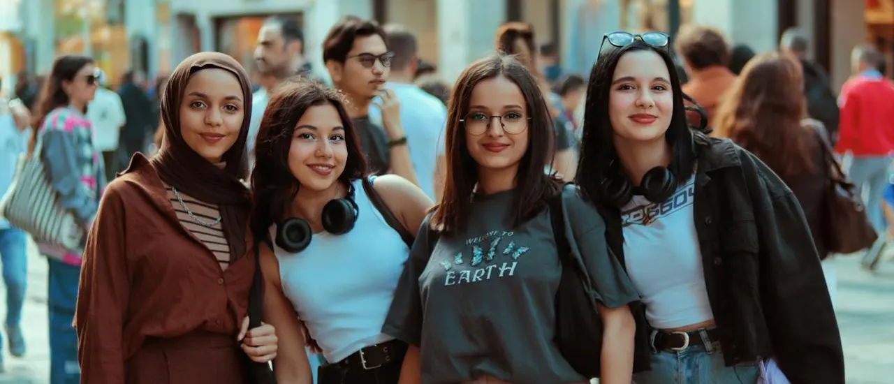 young women outside in an urban setting